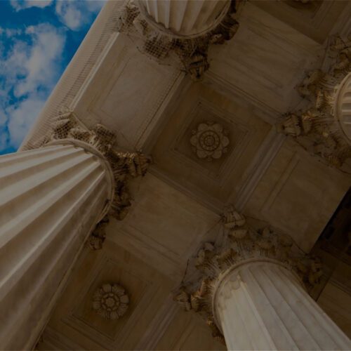 Looking up the columns at the Supreme Court building
