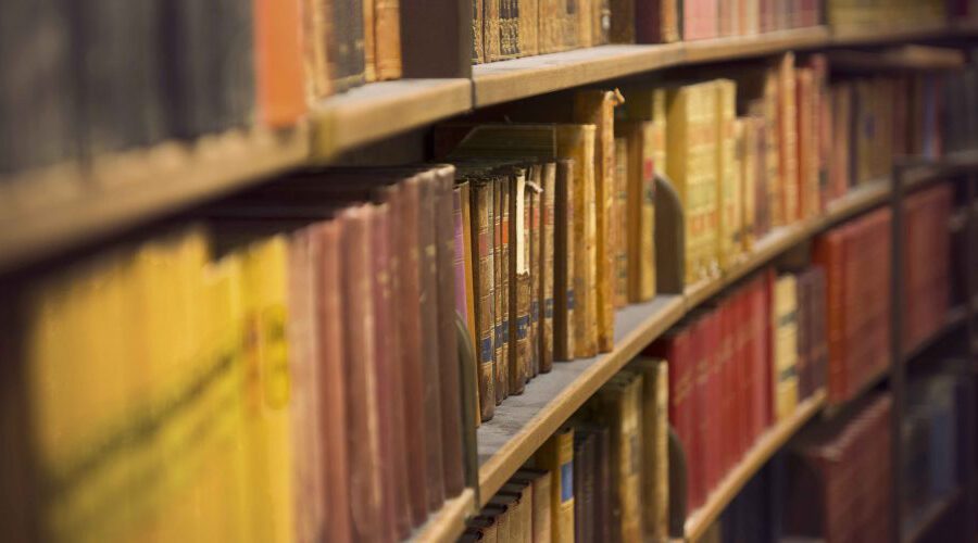 shelves of antique books