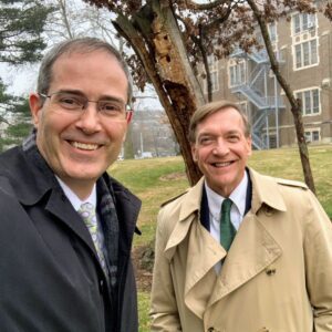 Chris Long and President Stanley in front of the Resilient Tree