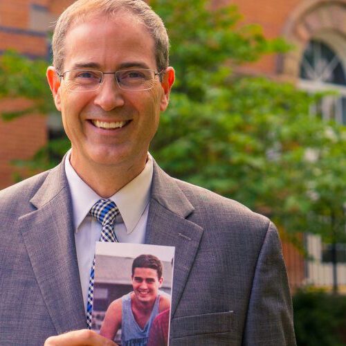 Dean Long with a photo of himself