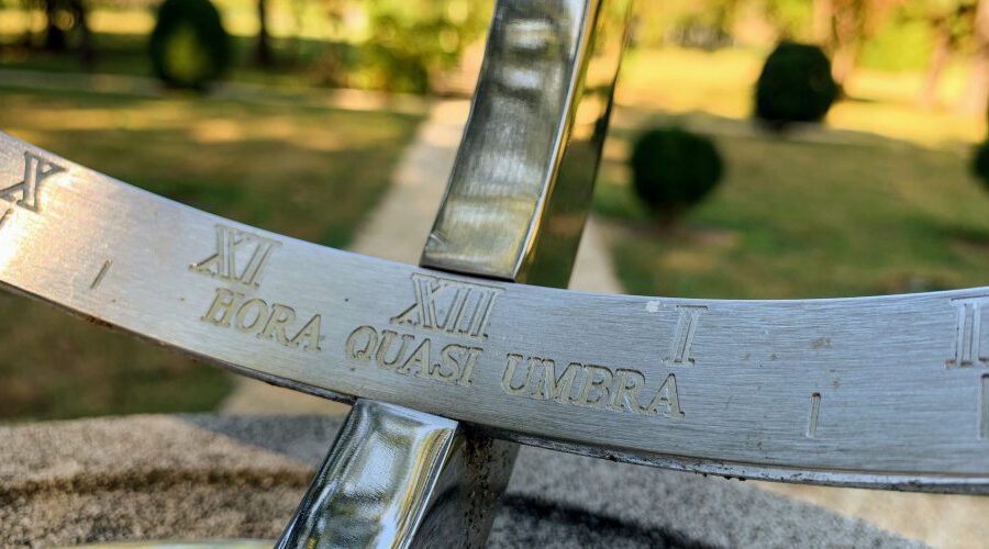 "Hora Quasi Umbra" text on a Sundial